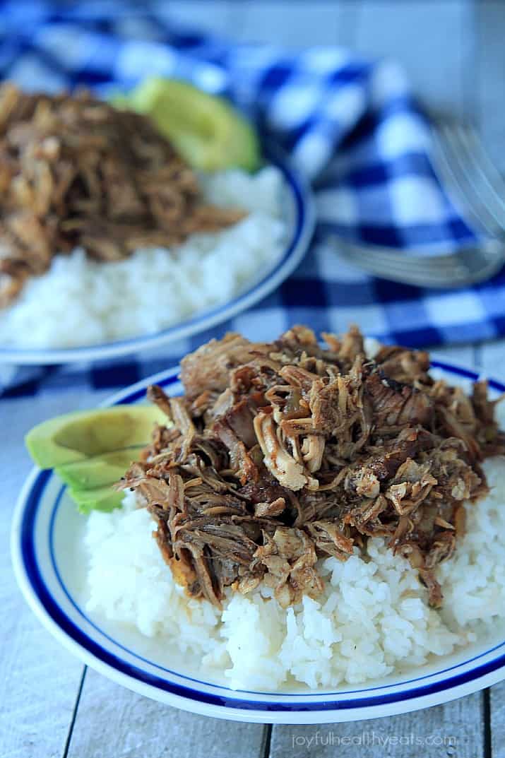 Crock Pot Honey Balsamic Pulled Pork on a plate over white rice with sliced avocado