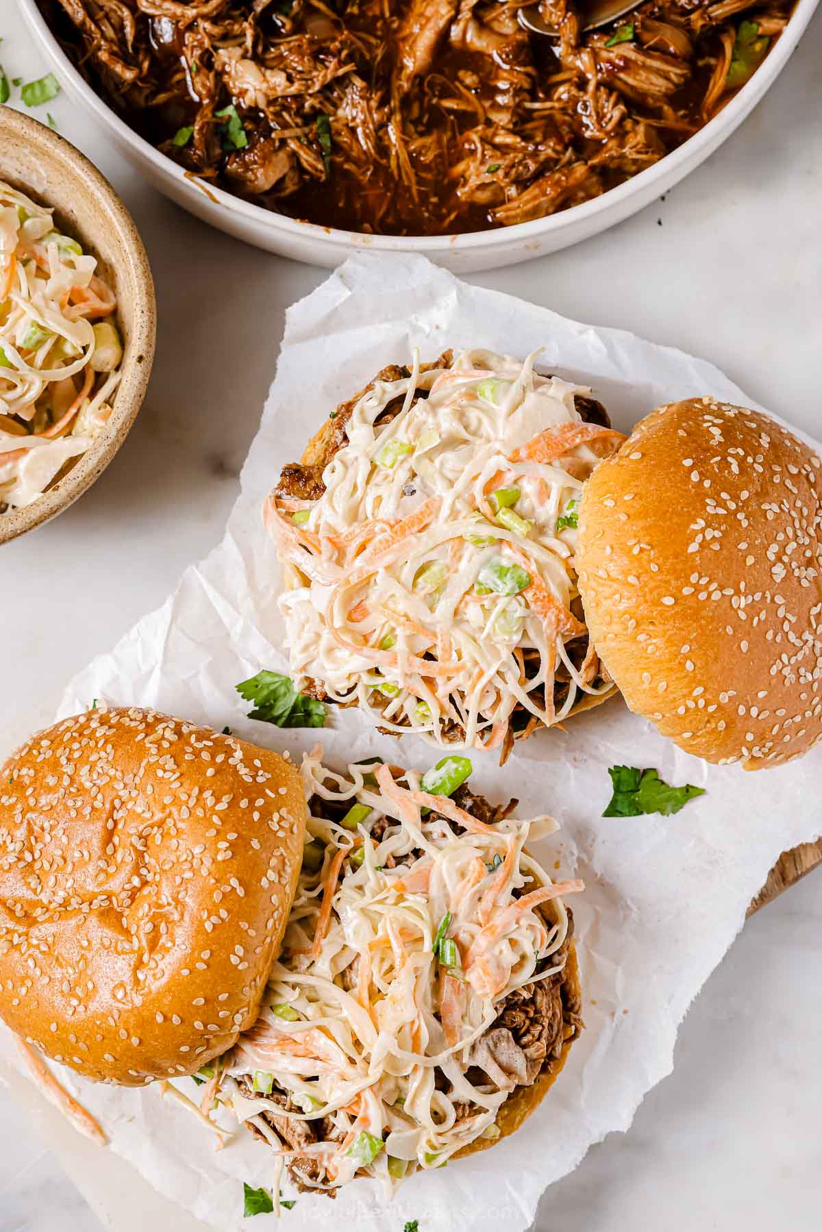 Pulled pork sliders with creamy slaw.