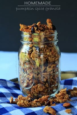 Homemade Pumpkin Spice Granola in a Mason Jar on a Checkered Napkin