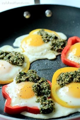 Five Egg in a Holes with Basil Pesto on a Frying Pan