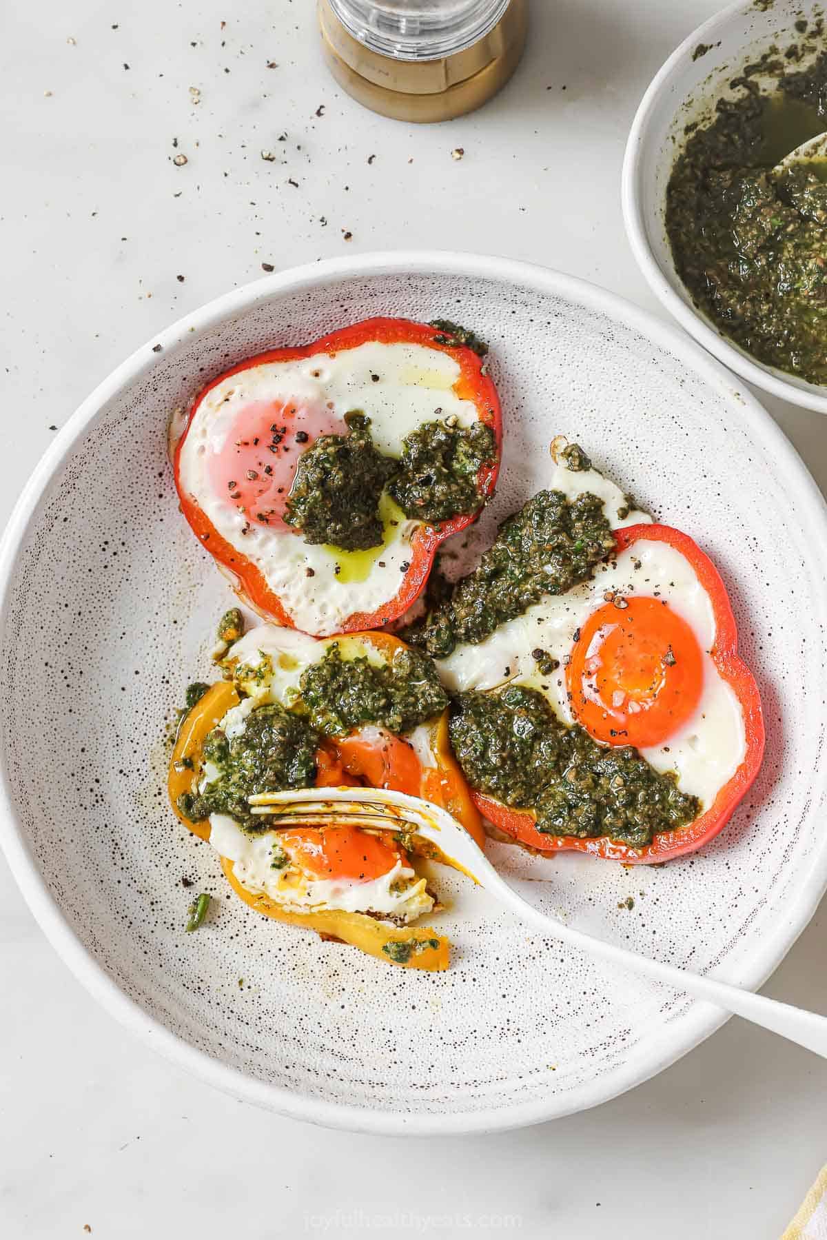 Eggs in a hole cut down by fork.