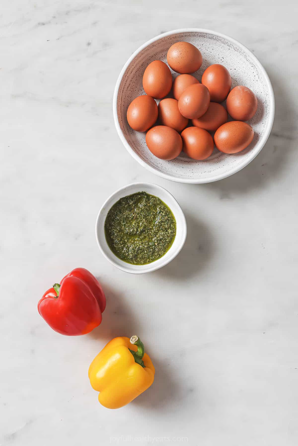 Eggs, peppers and pesto for Eggs in a hole.