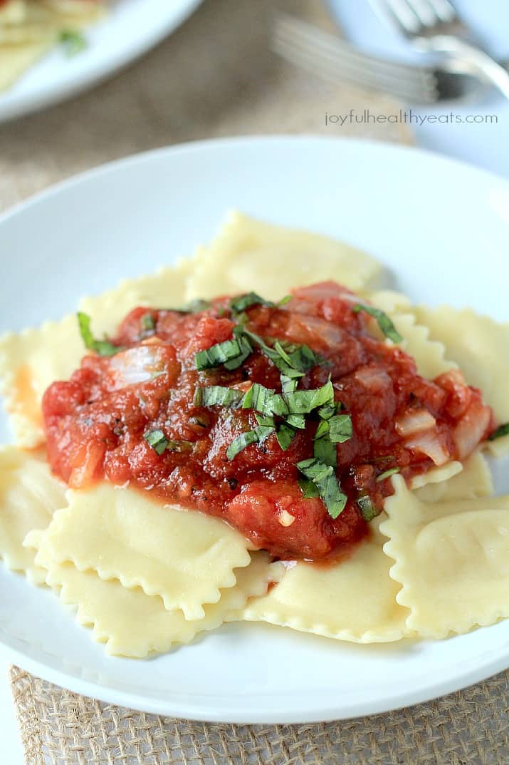 Four Cheese Ravioli with Homemade Marinara Sauce on a plate