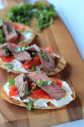 Grilled Ribeye & Roasted Pepper Bruschetta with Whipped Goat Cheese, the ultimate mouth watering appetizer! | www.joyfulhealthyeats.com