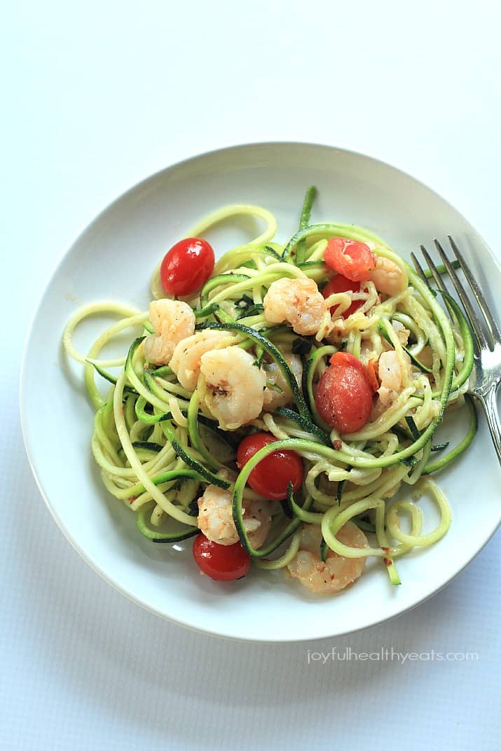 Healthy never tasted so good with this Shrimp Scampi & Zucchini Noodles, made in less than 30 minutes. | www.joyfulhealthyeats.com #paleo #glutenfree