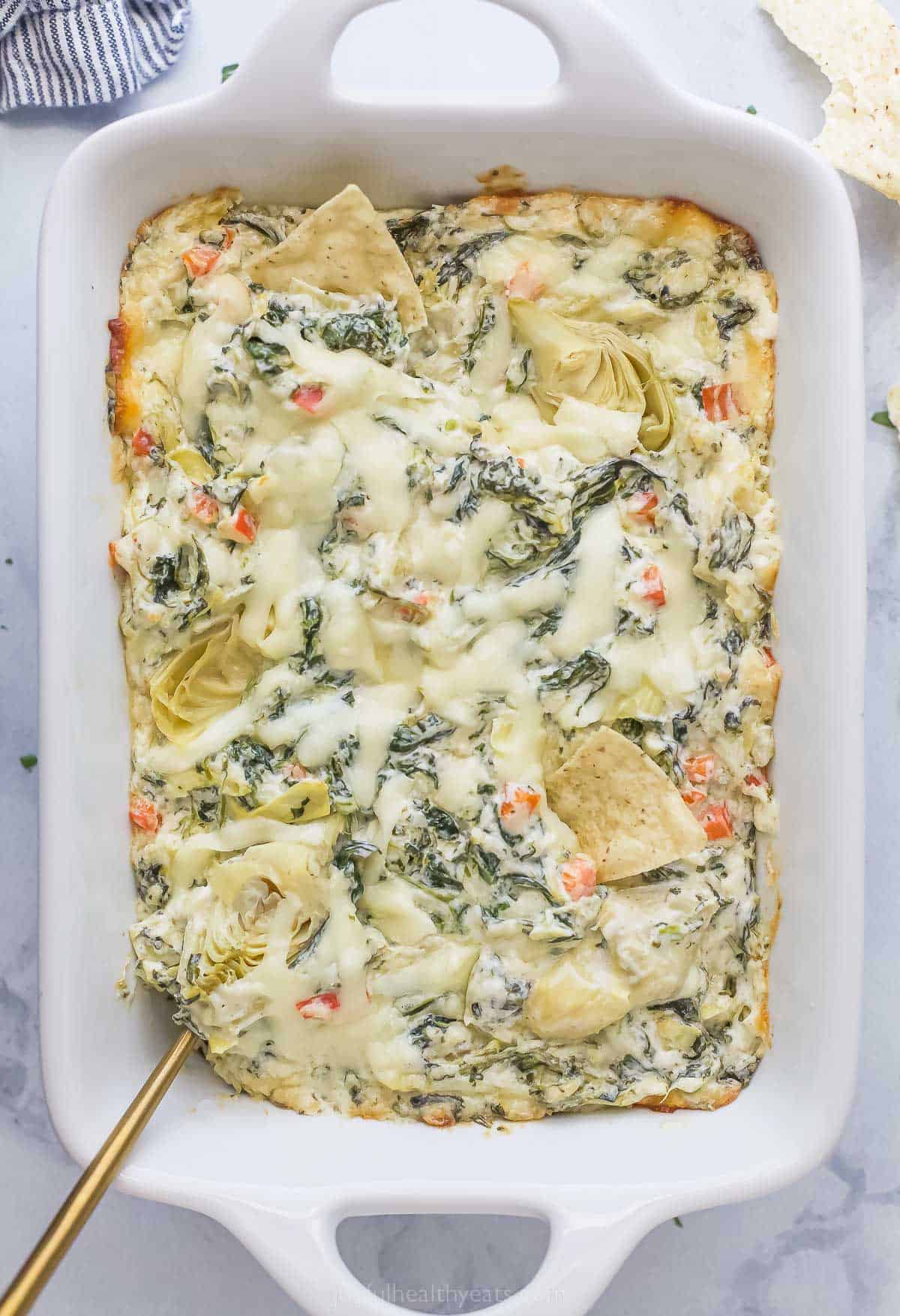 casserole dish with creamy spinach dip