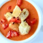 A hearty Tuscan Tomato Soup with Homemade Rosemary Garlic Croutons! | www.joyfulhealthyeats.com | #wintersoup #souprecipes #vegetarian #freezerfriendly