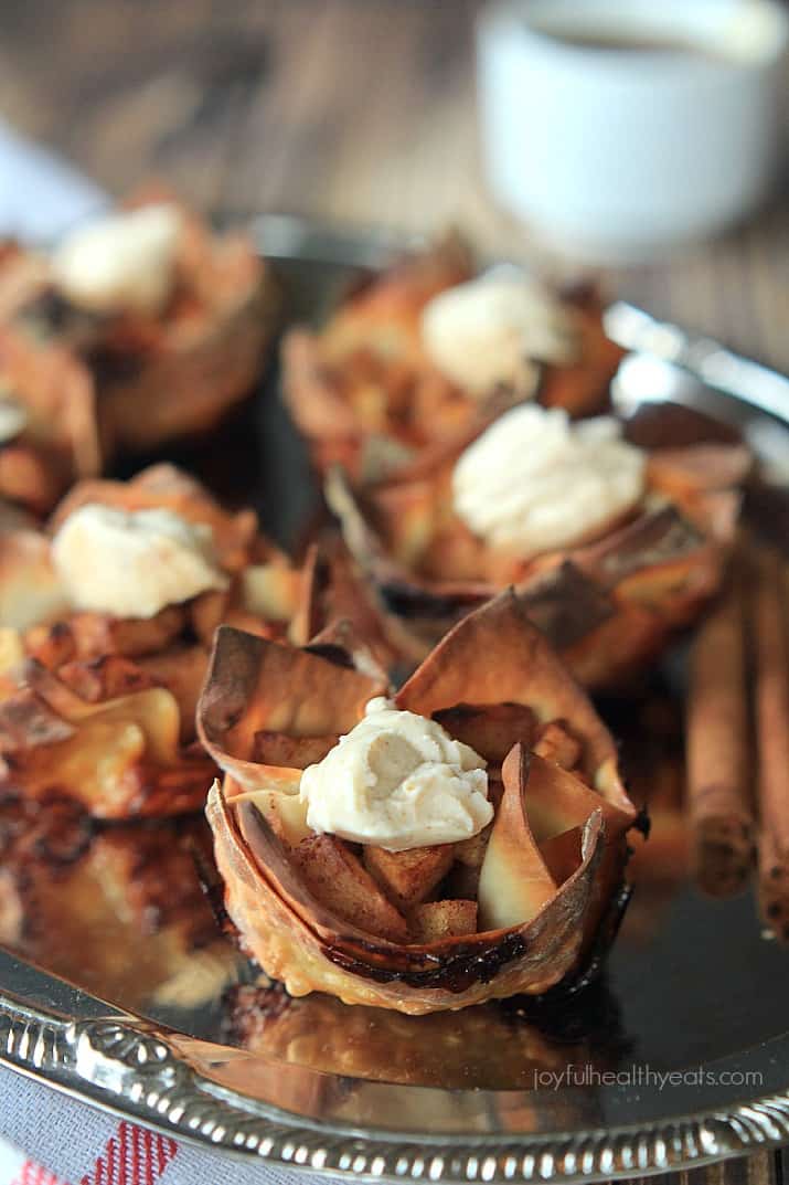 Close-up view of Caramel Apple Pie Wonton Cups with Honey Cinnamon Mascarpone on top