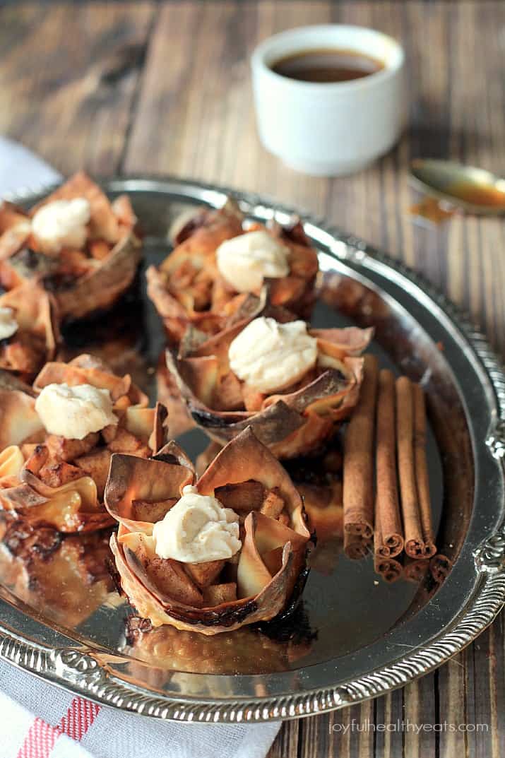 Caramel Apple Pie Wonton Cups topped with Honey Cinnamon Mascarpone on a silver platter