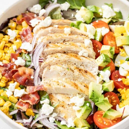 Chicken Cobb salad in bowl before adding dressing