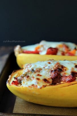 An easy healthy spanish inspired weeknight dinner, Chorizo Kale & Pepper Stuffed Spaghetti Squash Boats! | www.joyfulhealthyeats.com
