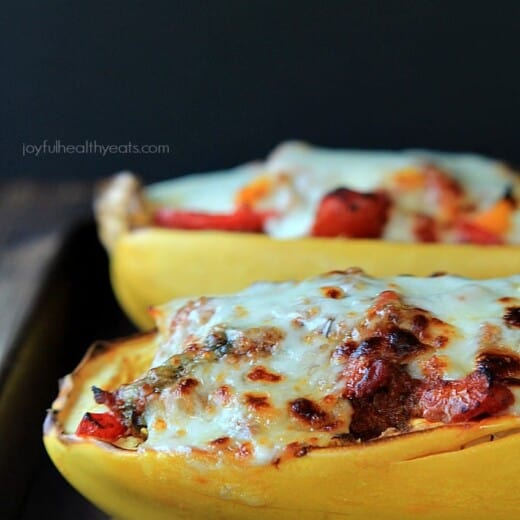 An easy healthy spanish inspired weeknight dinner, Chorizo Kale & Pepper Stuffed Spaghetti Squash Boats! | www.joyfulhealthyeats.com