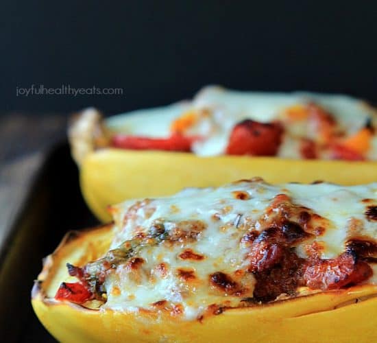 An easy healthy spanish inspired weeknight dinner, Chorizo Kale & Pepper Stuffed Spaghetti Squash Boats! | www.joyfulhealthyeats.com