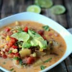 A Bowl of Crock Pot Southwestern Corn & Potato Chowder with Lime Slices