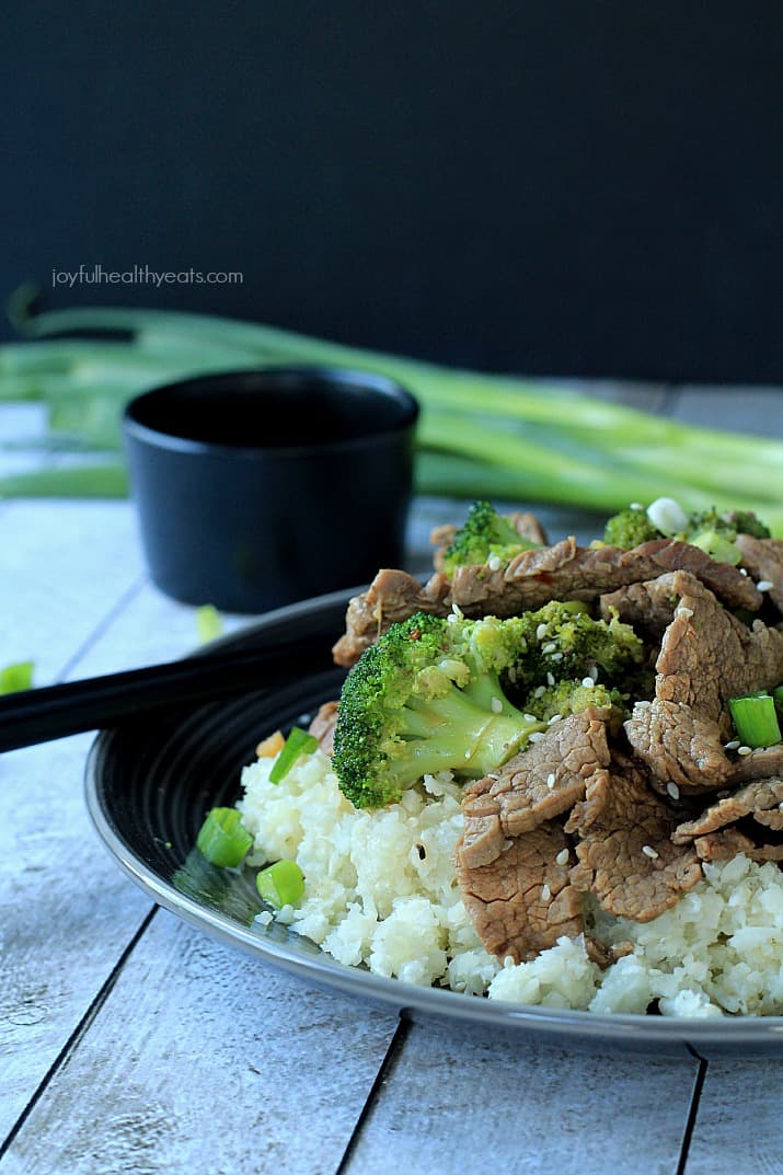 An easy to make Paleo & Gluten Free recipe packed with flavor! Beef & Broccoli Stir fry with Cauliflower Rice | www.joyfulhealthyeats.com