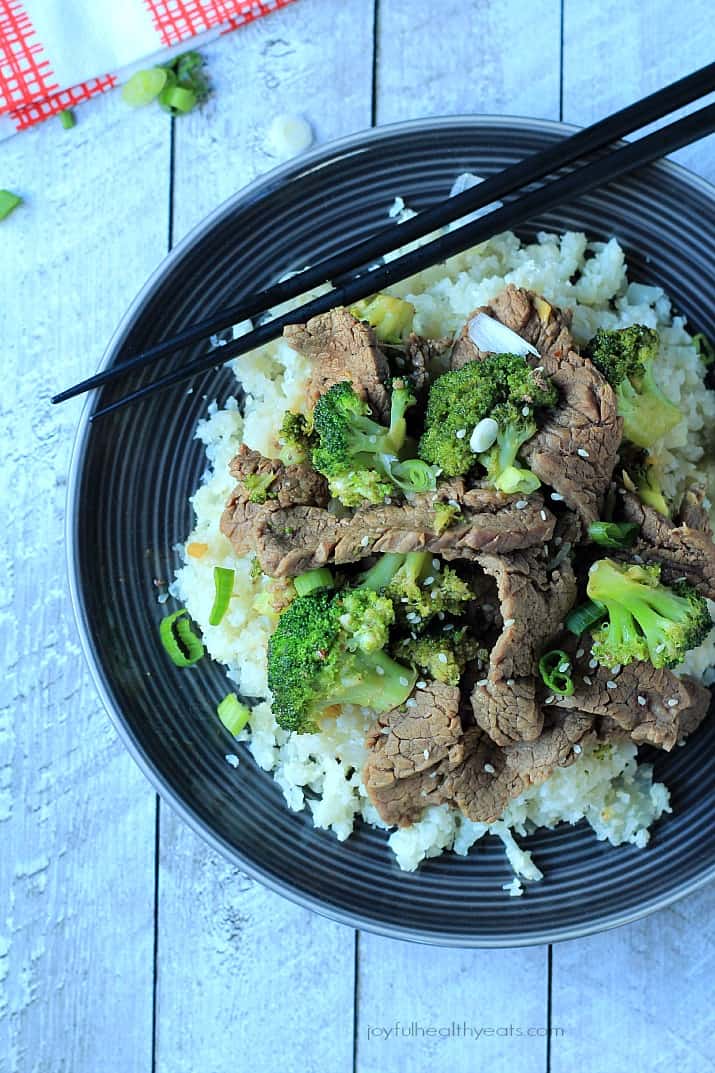 An easy to make Paleo & Gluten Free recipe packed with flavor! Beef & Broccoli Stir fry with Cauliflower Rice | www.joyfulhealthyeats.com