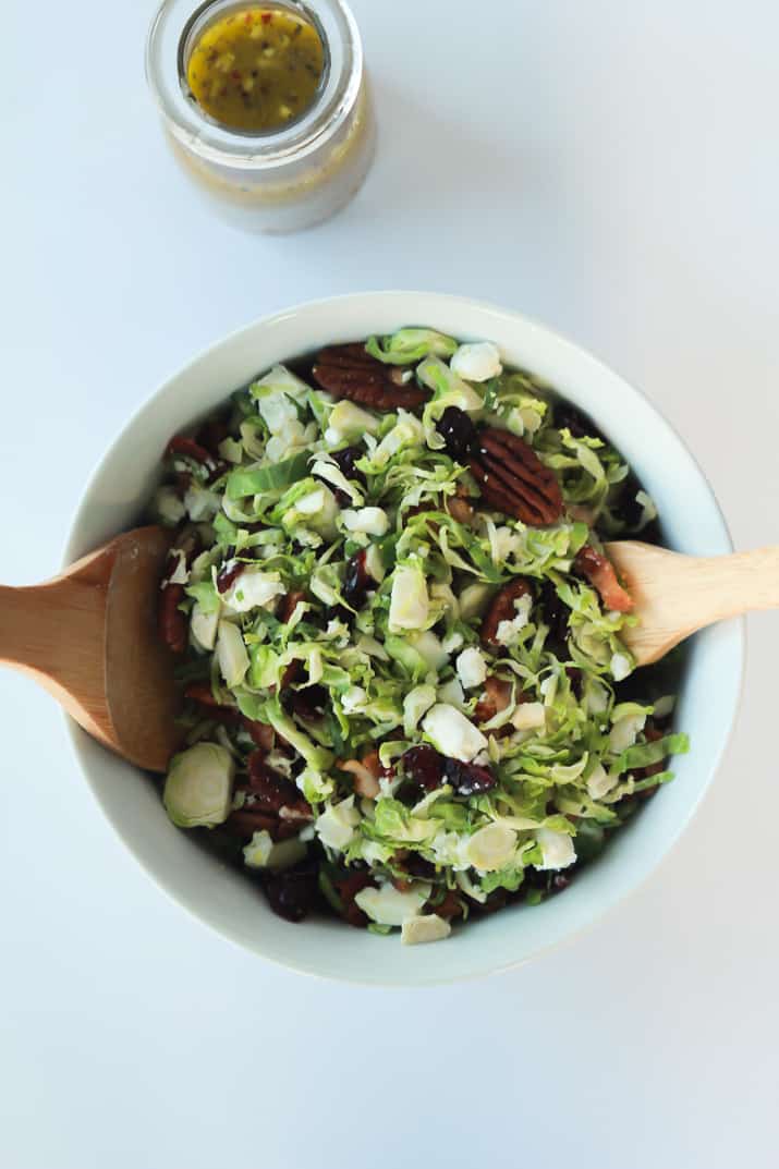 You need this Salad in your life & on the table! Shaved Brussels Sprouts Harvest Salad with Hard Apple Cider Vinaigrette | www.joyfulhealthyeats.com #thanksgiving #healthy 