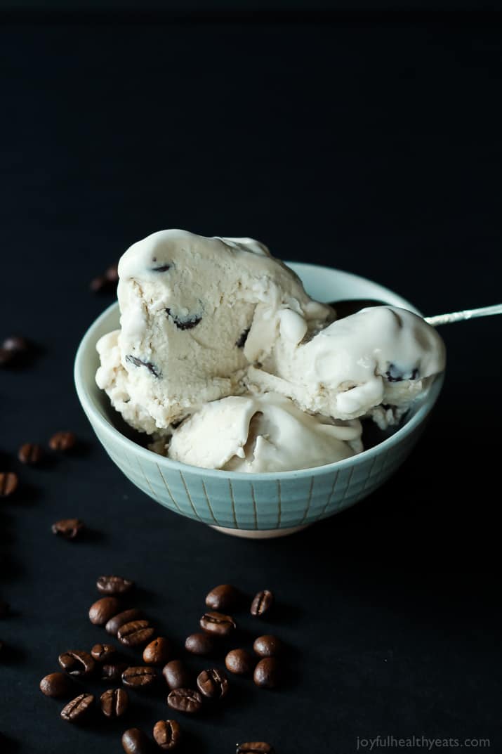 A Bowl of Espresso Chocolate Chip Ice Cream Next to Some Espresso Beans