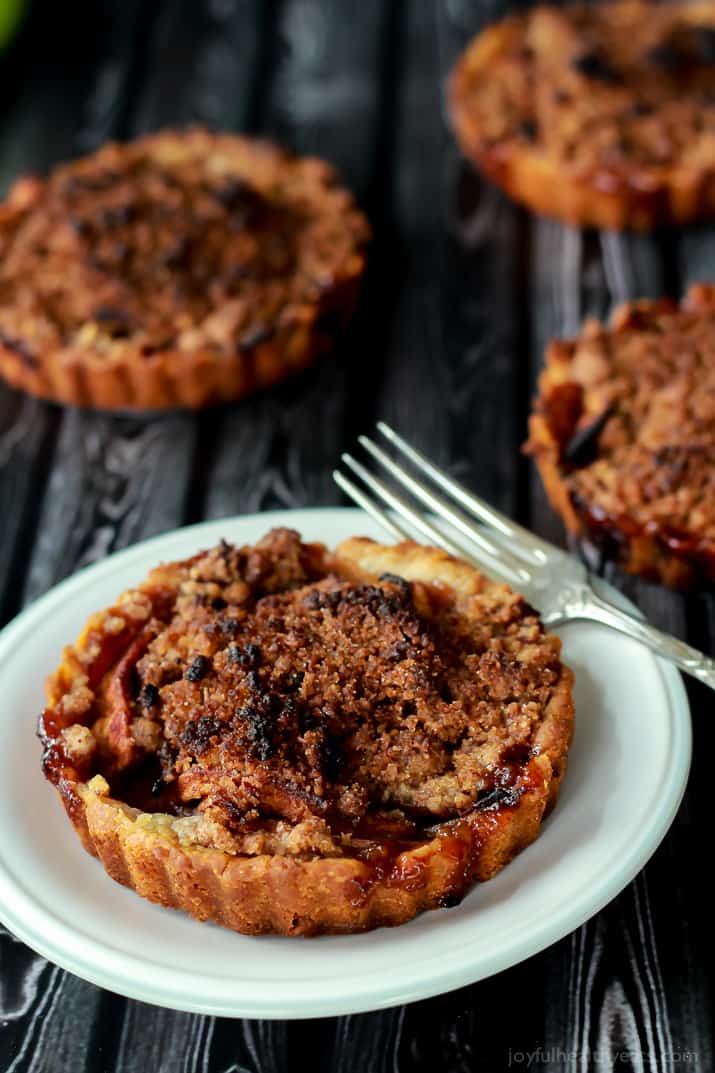 Built in portion control makes these Mini Apple Pie Tartlets with Pecan Streusel extra irresistible! The ultimate fall dessert! | www.joyfulhealthyeats.com Built in portion control makes these Mini Apple Pie Tartlets with Pecan Streusel extra irresistible! The ultimate fall dessert! | www.joyfulhealthyeats.com 