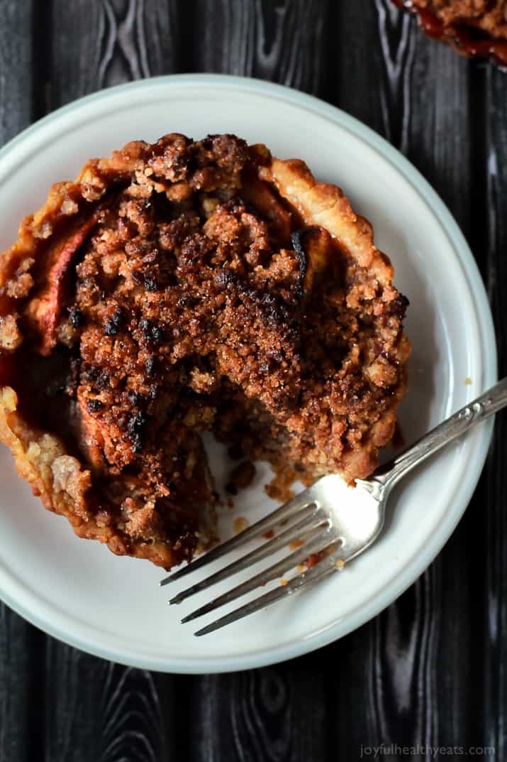 Built in portion control makes these Mini Apple Pie Tartlets with Pecan Streusel extra irresistible! The ultimate fall dessert! | www.joyfulhealthyeats.com 