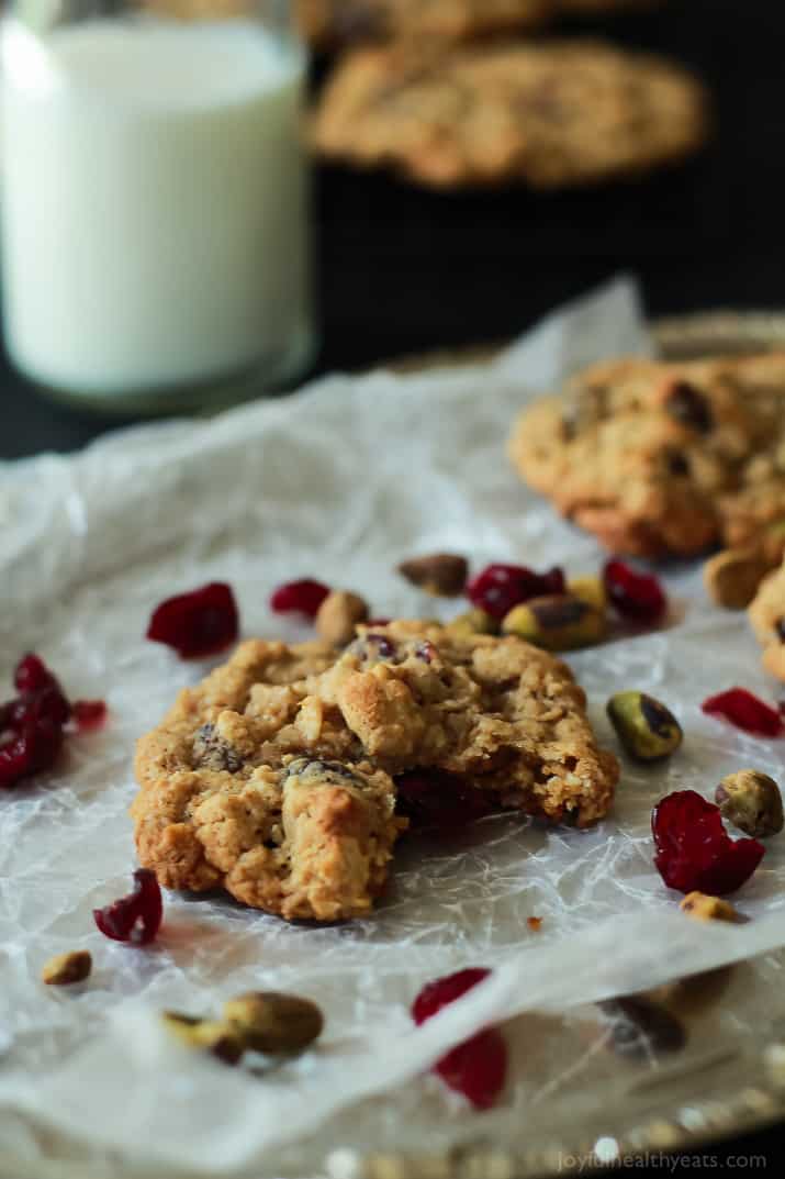 A Pistachio Cranberry Oatmeal Cookie with a Bite Taken Out of It