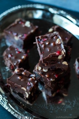 A guilt free holiday classic made "skinny"! This Dark Chocolate Pomegranate Hazelnut Fudge is seriously so good, you need to make it! | www.joyfulhealthyeats.com