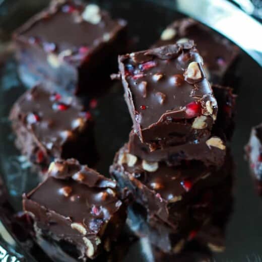 A guilt free holiday classic made "skinny"! This Dark Chocolate Pomegranate Hazelnut Fudge is seriously so good, you need to make it! | www.joyfulhealthyeats.com