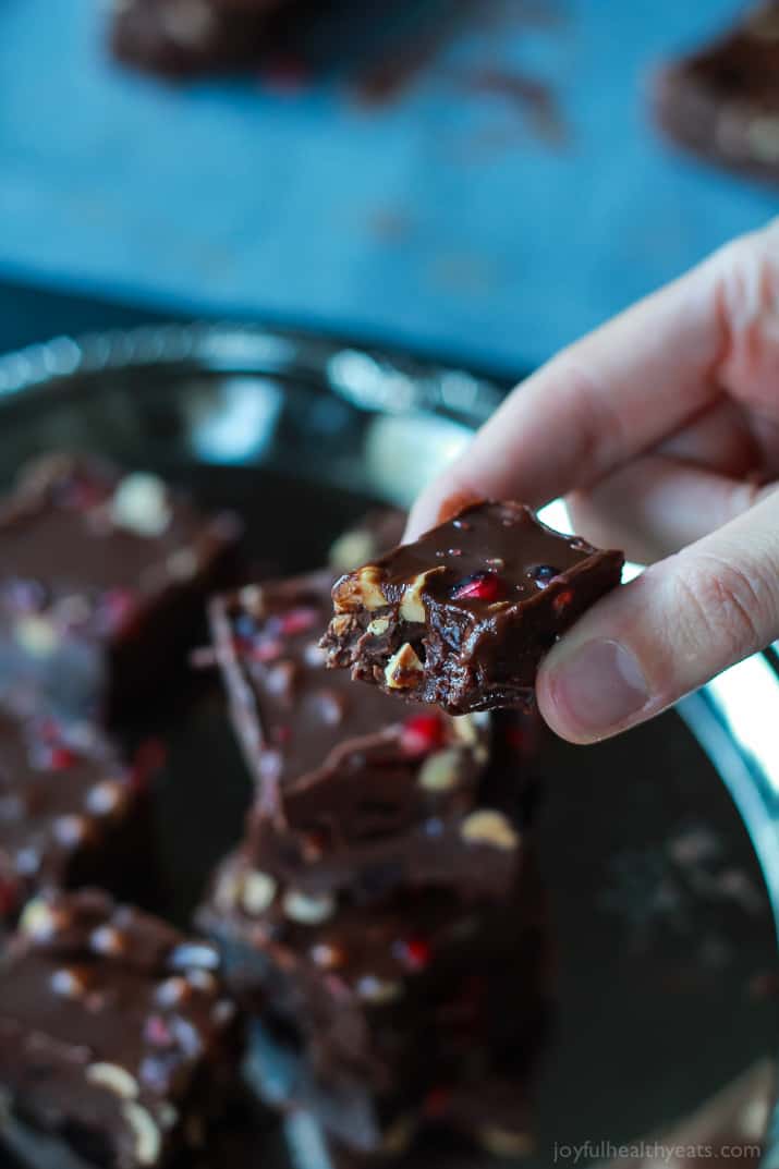 A guilt free holiday classic made "skinny"! This Dark Chocolate Pomegranate Hazelnut Fudge is seriously so good, you need to make it! | www.joyfulhealthyeats.com