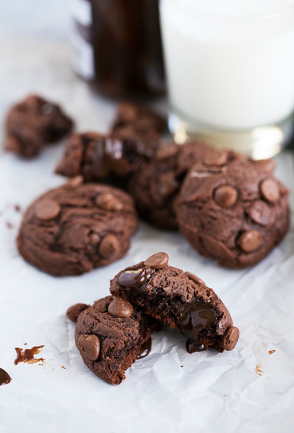 A Triple Chocolate Hot Fudge Brownie Cookie Split in Half