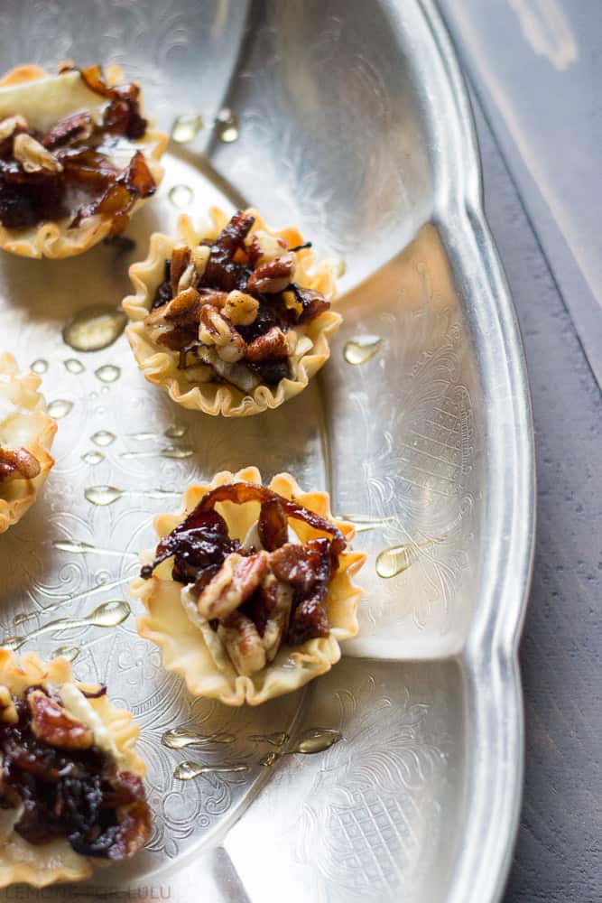 Four Baked Brie Caramelized Onion Cups in a Pie Tin