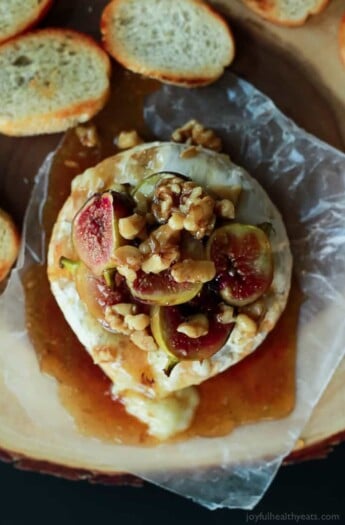 This Baked Brie appetizer rocks!! Especially with the Roasted Fig Honey Walnut Topping... Must make! | www.joyfulhealthyeats.com