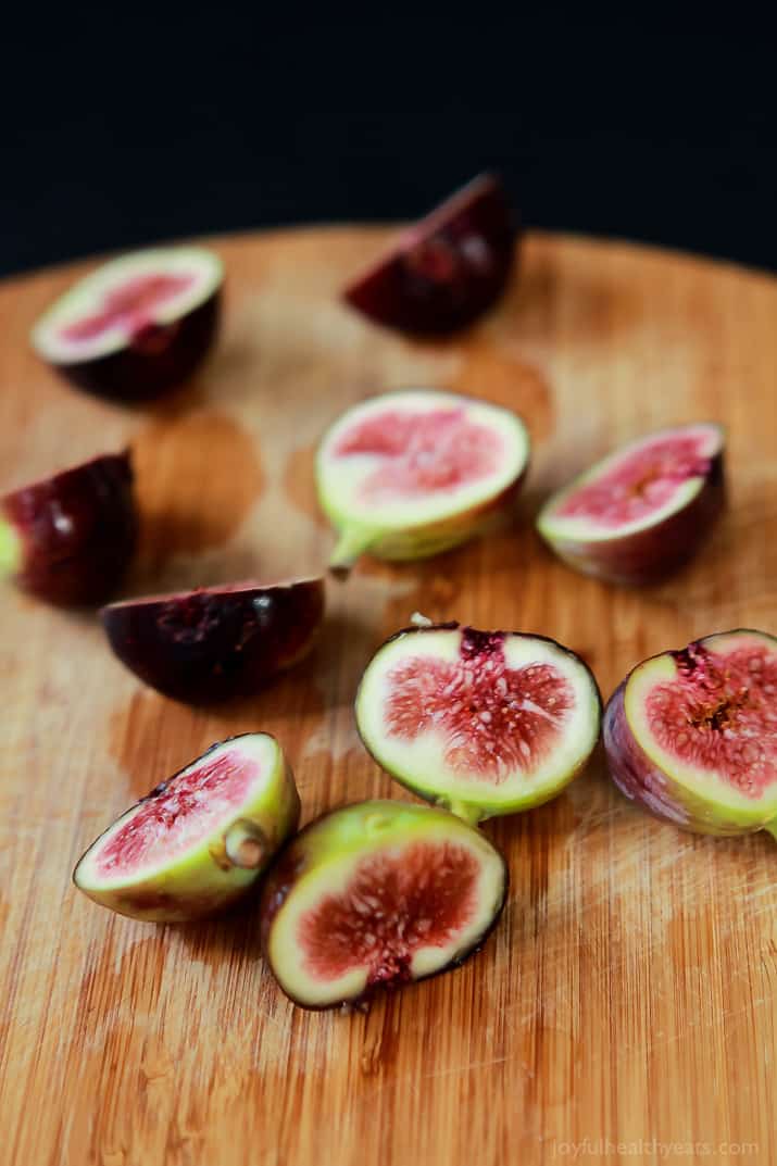 Fig halves on a cutting board