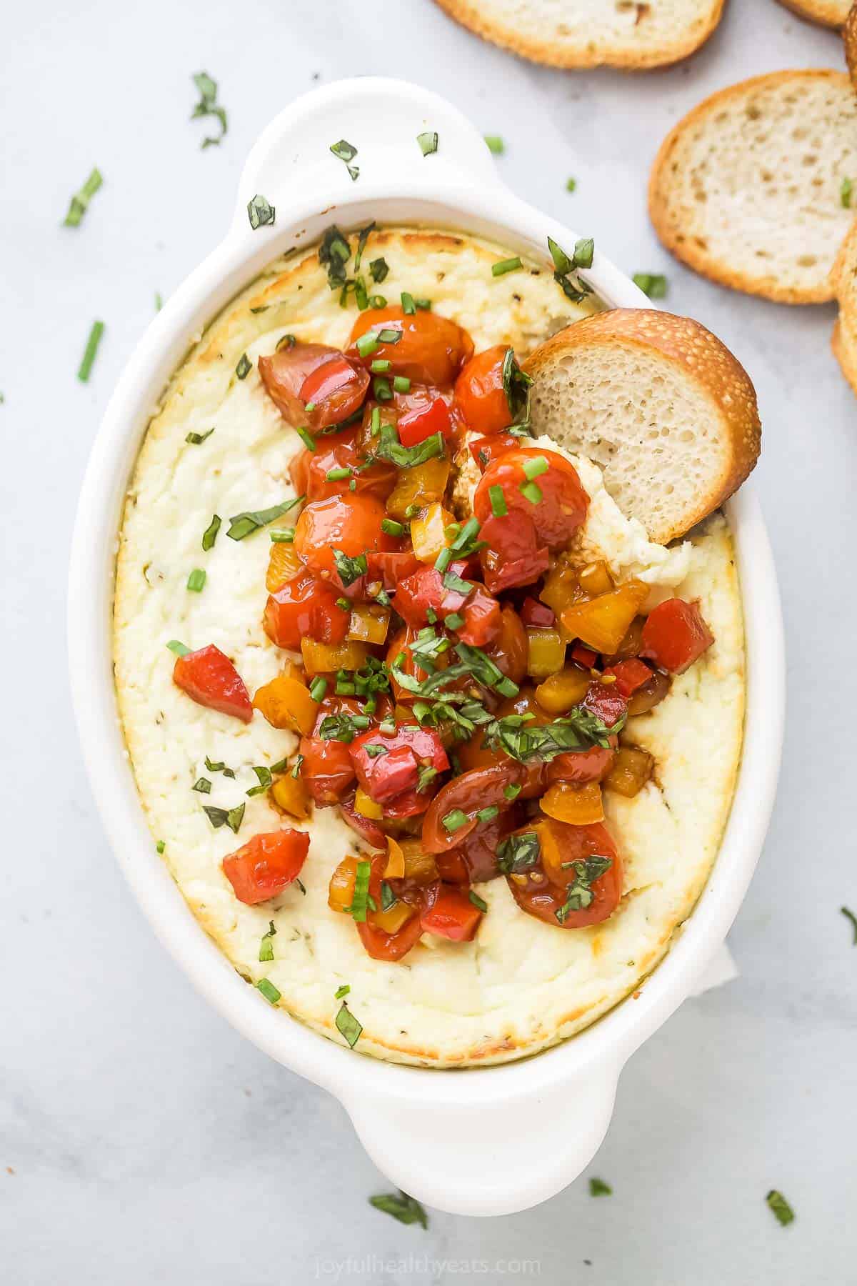 Goat cheese dip with a toasty baguette slice. 