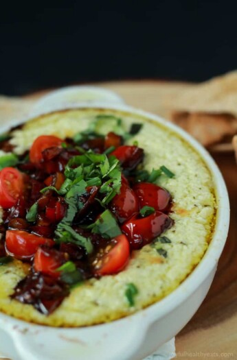 A quick appetizer recipe perfect for the holidays, this Baked Goat Cheese Dip will rock your world! | www.joyfulhealthyeats.com