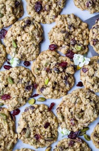 photo of Chewy Pistachio Cranberry Oatmeal Cookies on parchment paper