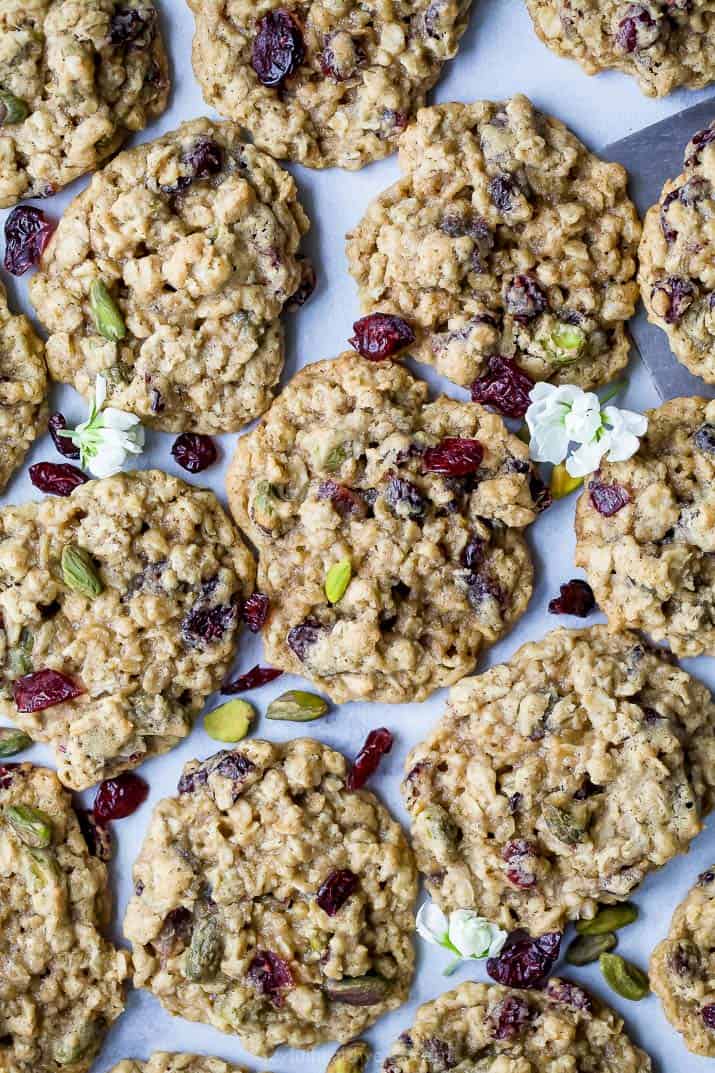photo of Chewy Pistachio Cranberry Oatmeal Cookies on parchment paper
