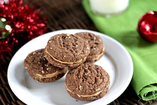 Four Mexican Hot Chocolate Cookies on a Plate Next to a Green Placemat