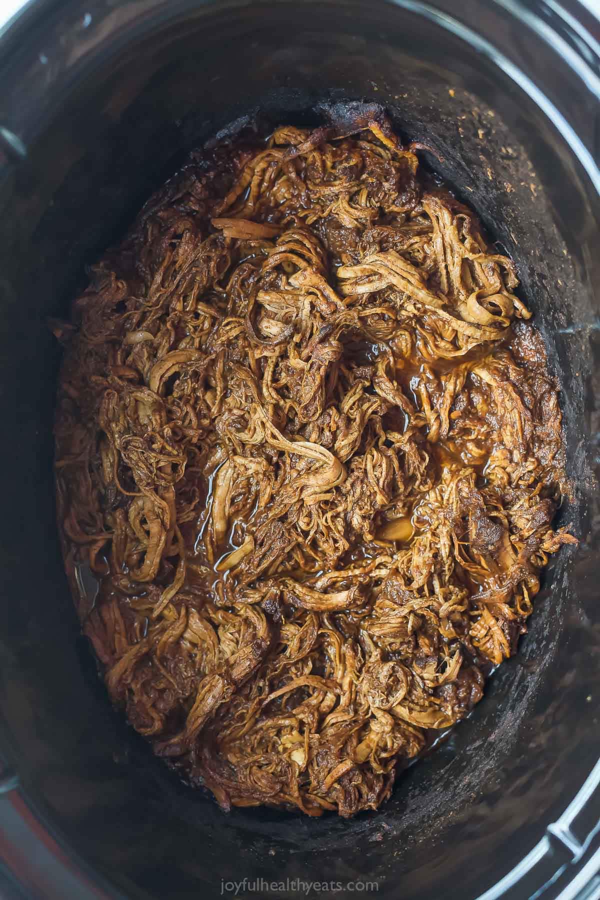 Pulled pork in slow cooker.