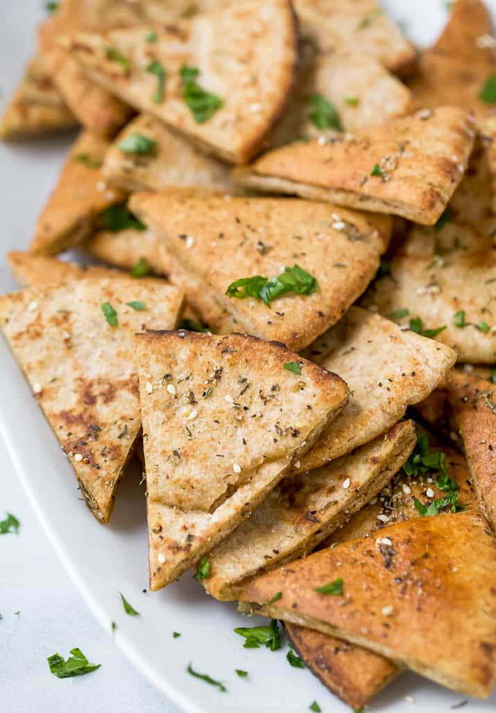 homemade baked pita chips on a plate