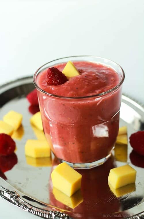 Nutrient packed Raspberry Mango Smoothie that is dairy free & sugar free and absolutely delicious! | www.joyfulheatlhyeats.com #eathealthy #recipes