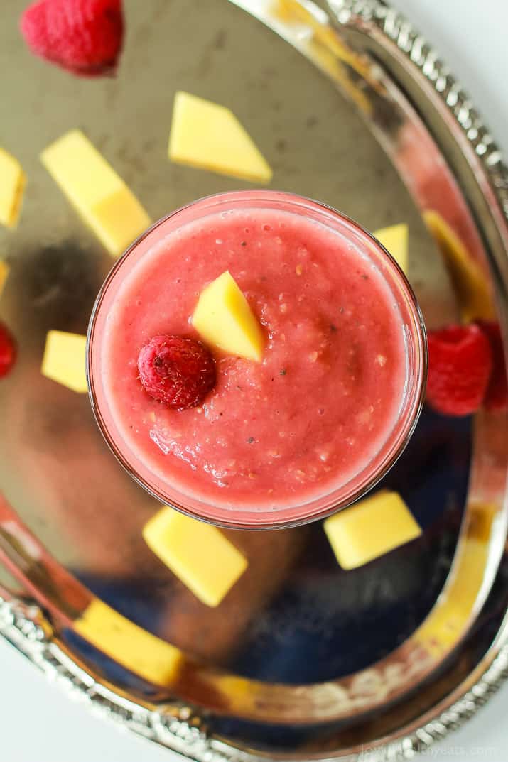 Nutrient packed Raspberry Mango Smoothie that is dairy free & sugar free and absolutely delicious! | www.joyfulheatlhyeats.com #eathealthy #recipes