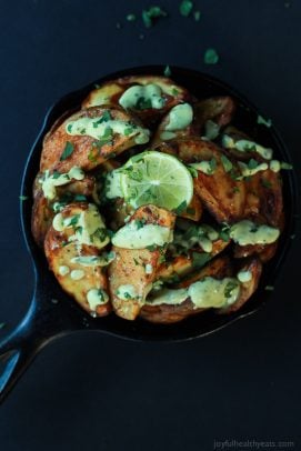 These Oven Roasted Potato Wedges actually turn out crispy, and the Avocado Wasabi Aioli rocks! | www.joyfulhealthyeats.com #recipes