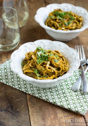 Two Bowls of Roasted Red Pepper Pesto Pasta with Two Glasses of White Wine