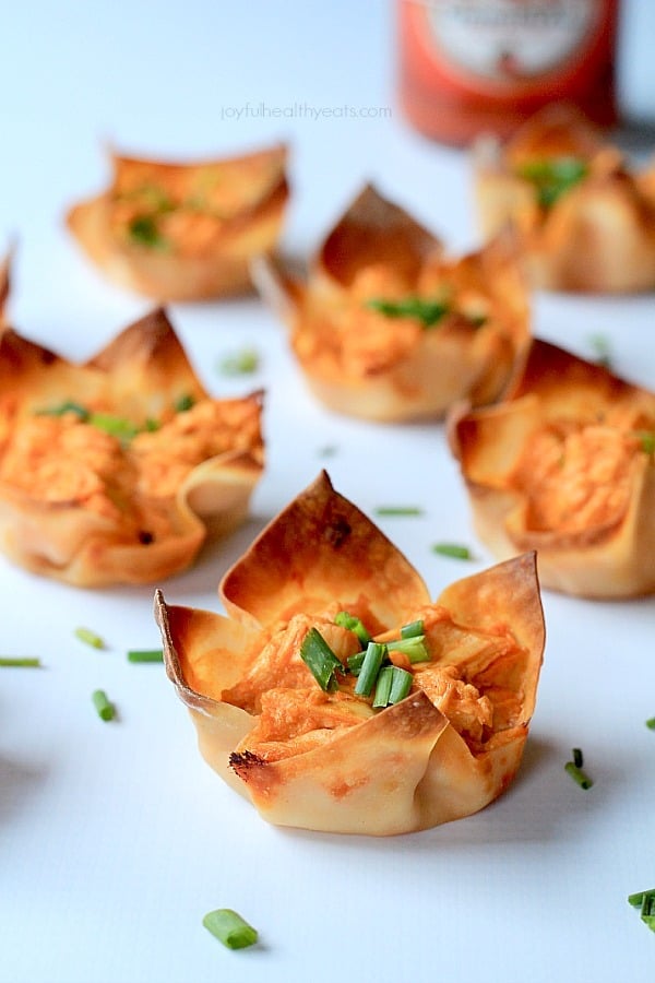 Skinny Buffalo Chicken Wonton Cups on a white surface 