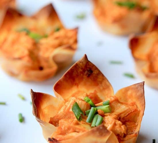 Buffalo Chicken Wonton Cups on a white surface