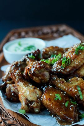Tangy Honey Mustard Baked Chicken Wings on white paper