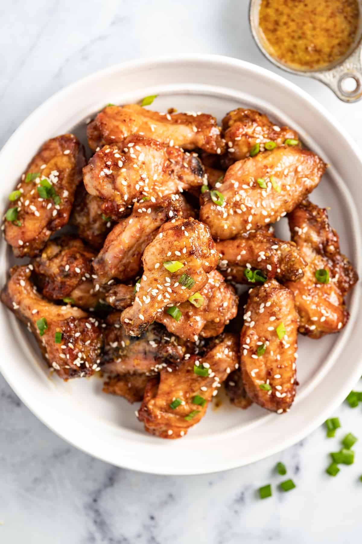 a platter of honey mustard baked chicken wings