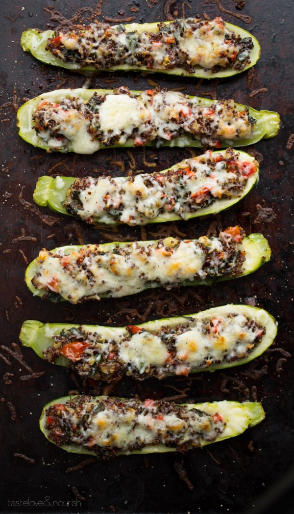 Six Vegetable and Quinoa Stuffed Zucchinis in a Line