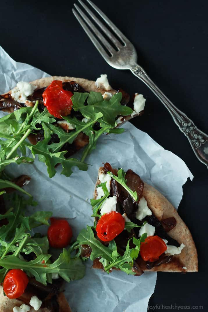 Quartered Pita Pizza with balsamic caramelized onions, feta, tomatoes, and arugula