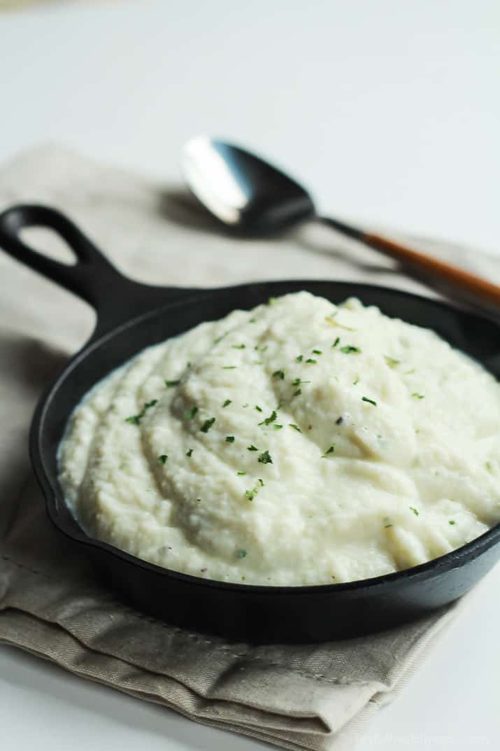 Cauliflower Alfredo Sauce in a Skillet on Top of a Cloth Napkin